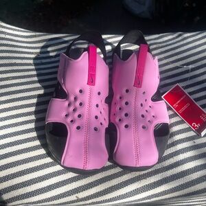 Nike Pink and Black Sandals with Comfort and Style